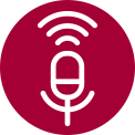 White microphone icon with sound waves on a grey background.